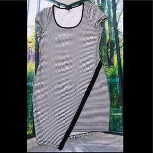 Curve hugging, striped dress w/asymmetrical bottom